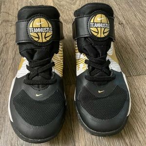 Boys size 13.5 Nike high tops (black,white and gold)